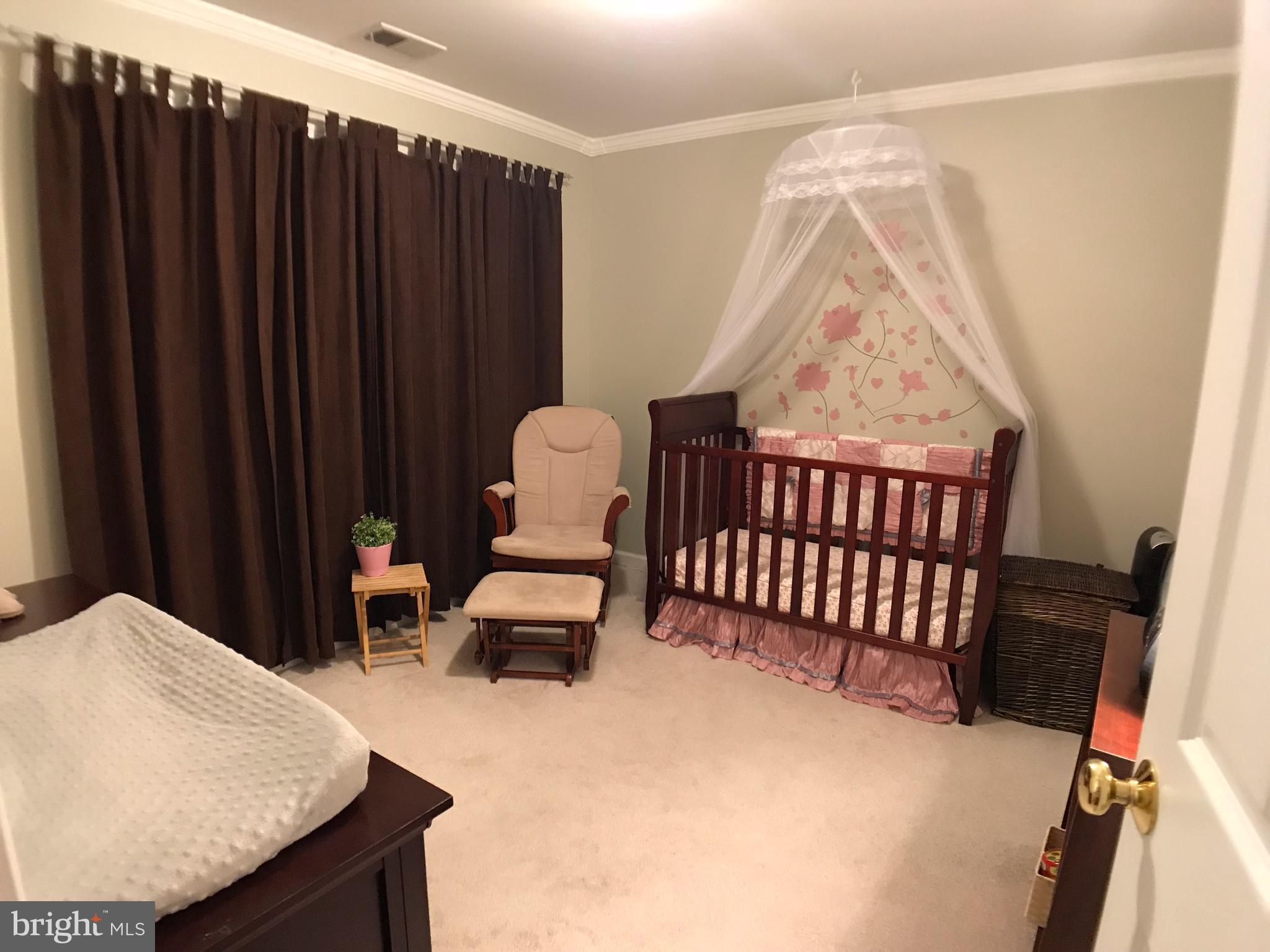 2313 Ruth Avenue Baltimore, MD 21219 - Photo 17 of 25 a room with furniture