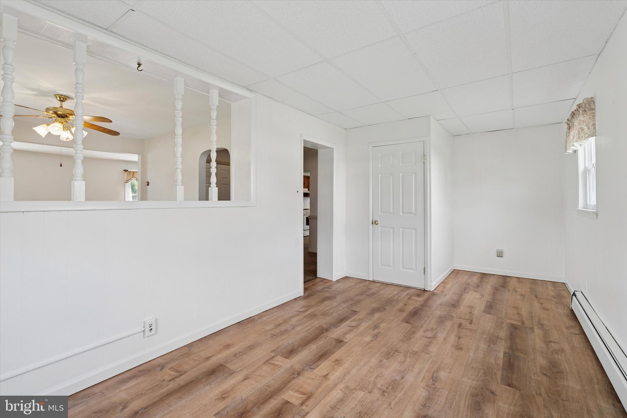 18 Lloyd Avenue Downingtown, PA 19335 - Photo 13 of 24 a view of a room with wooden floor and a window
