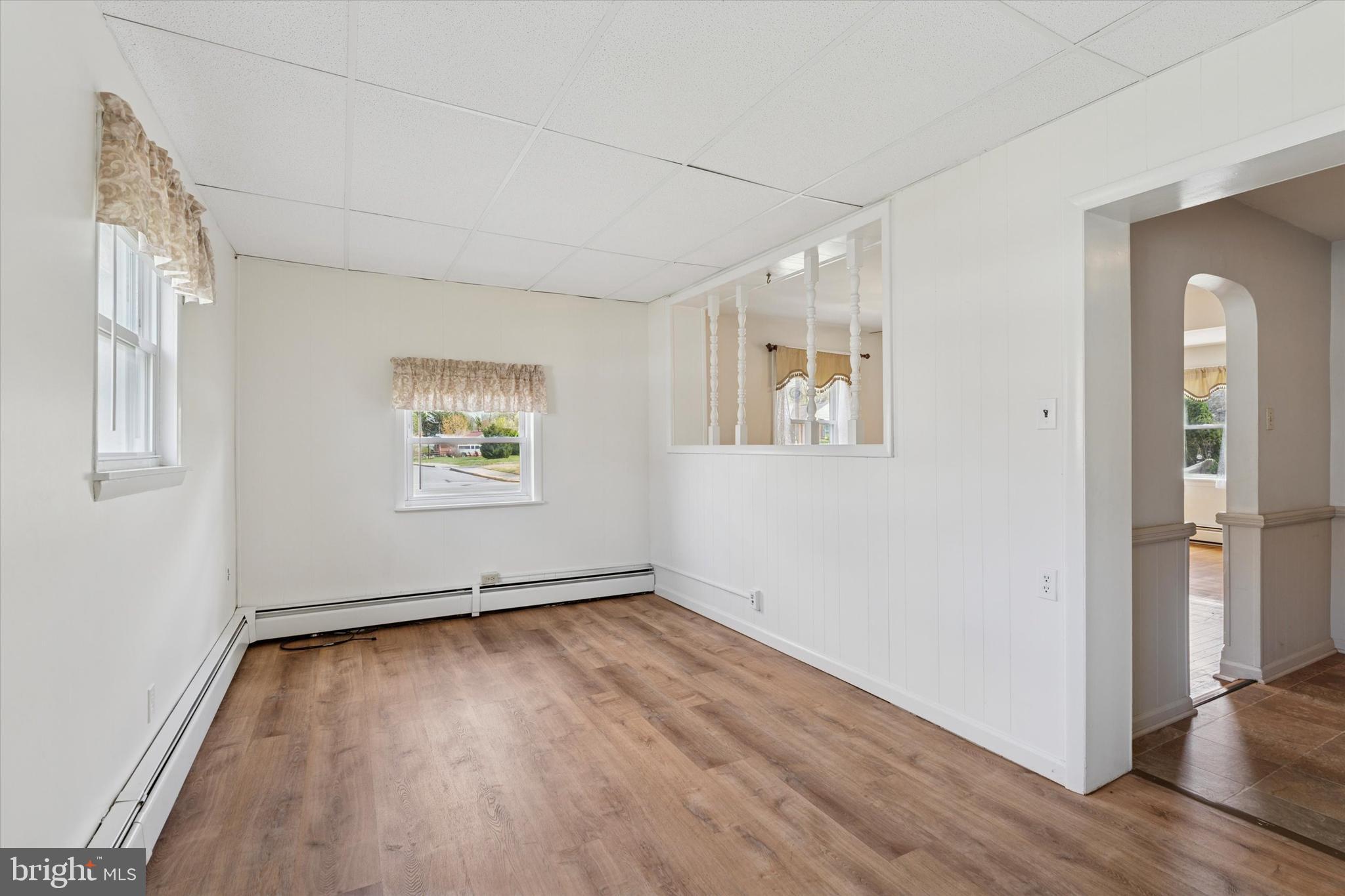 18 Lloyd Avenue Downingtown, PA 19335 - Photo 14 of 24 an empty room with wooden floor and windows