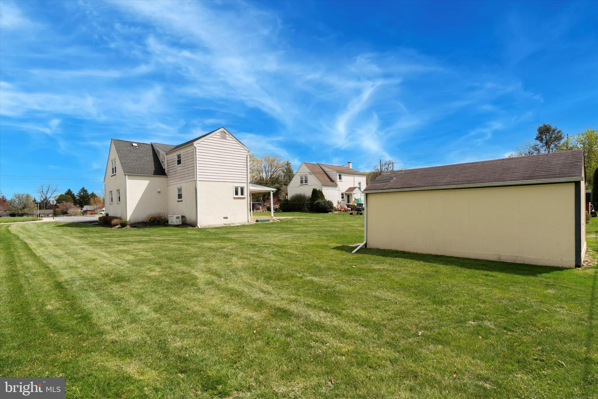 18 Lloyd Avenue Downingtown, PA 19335 - Photo 24 of 24 a view of a backyard with a garden
