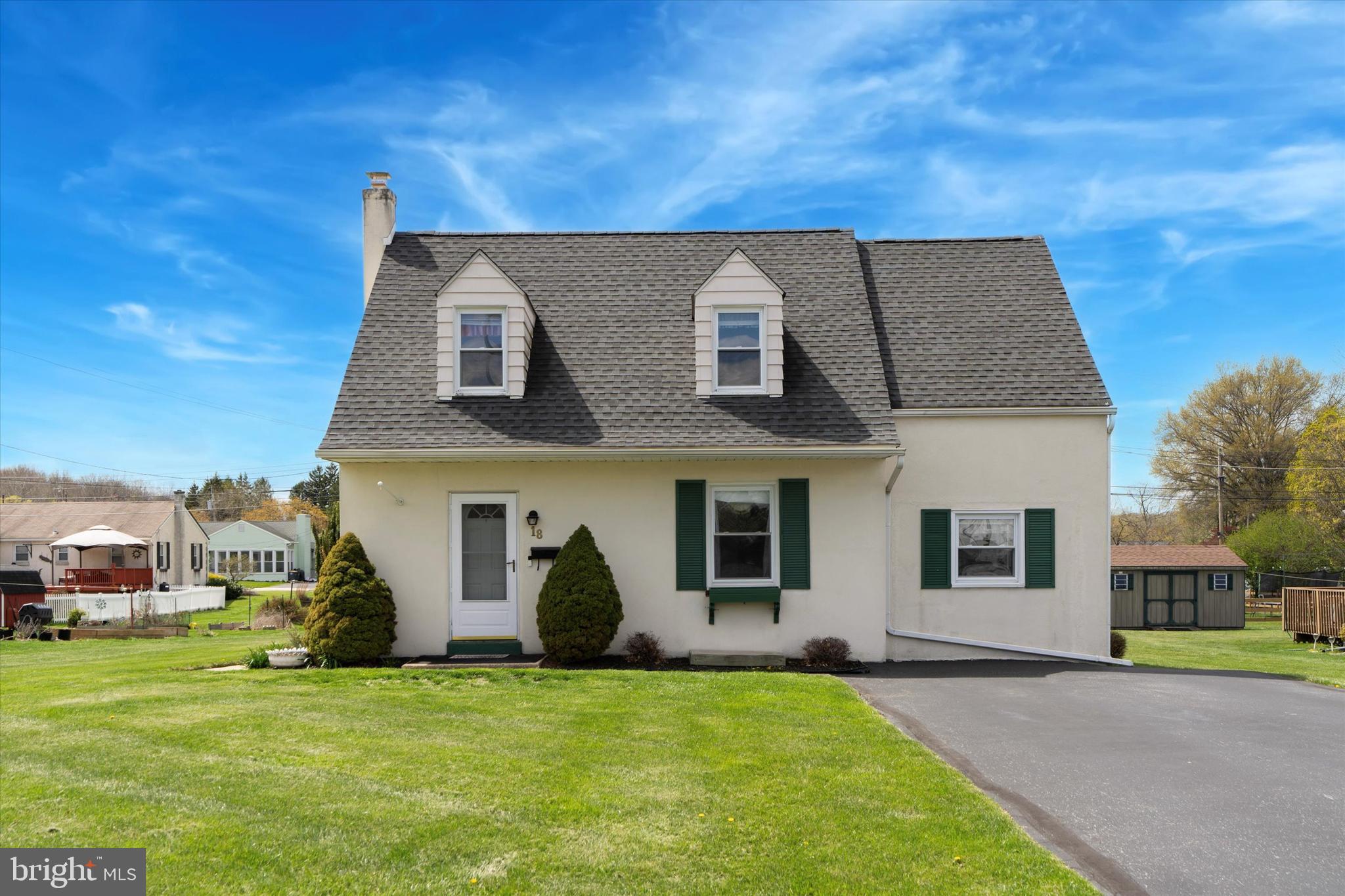 18 Lloyd Avenue Downingtown, PA 19335 - Photo 3 of 24 a house that has a big yard in front of it
