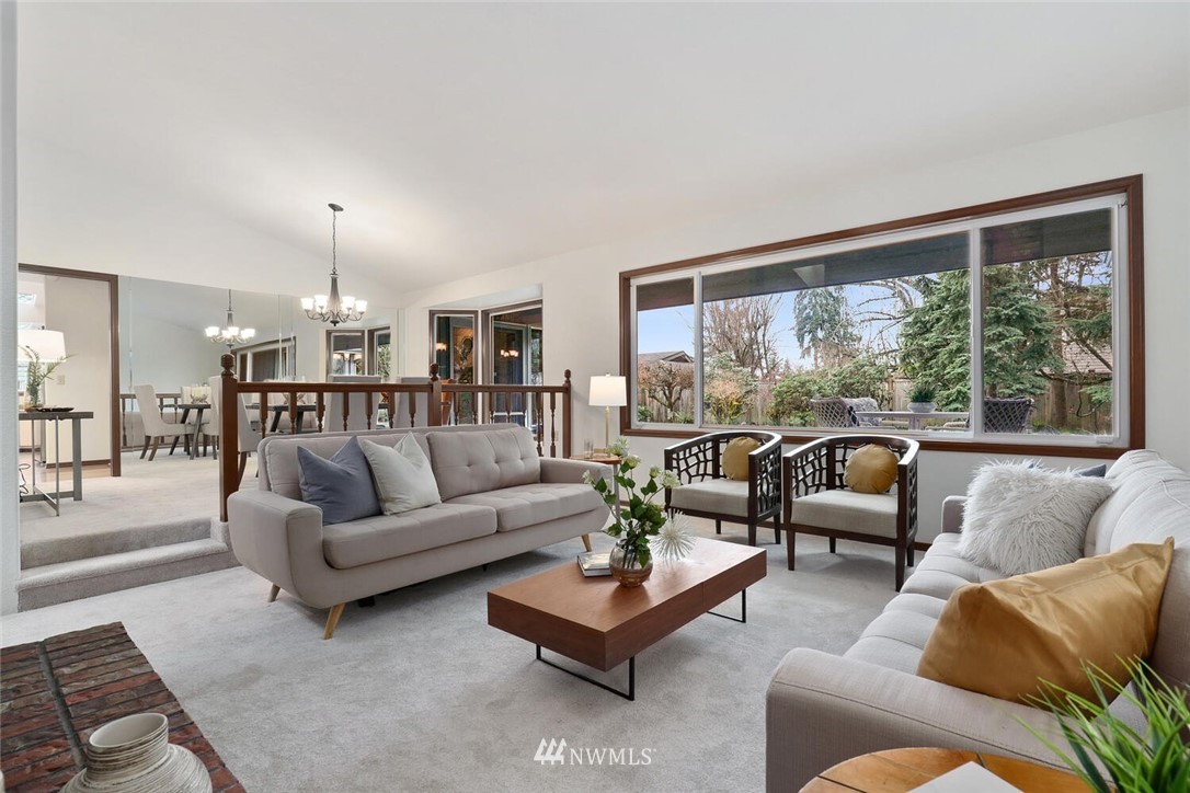 228 224th Street Southeast Bothell, WA 98021 - Photo 7 of 33 a living room with furniture and a large window