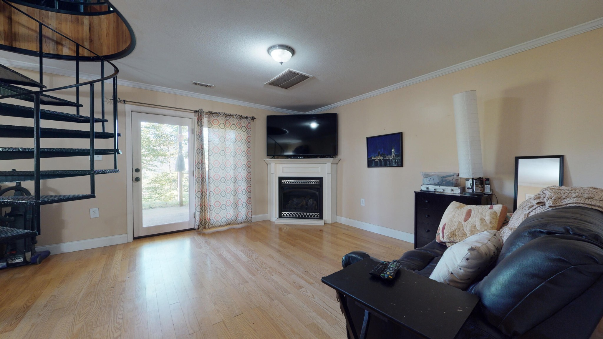 2031 Sulphur Springs Road Clinton, TN 37716 - Photo 18 of 31 a living room with furniture and a flat screen tv