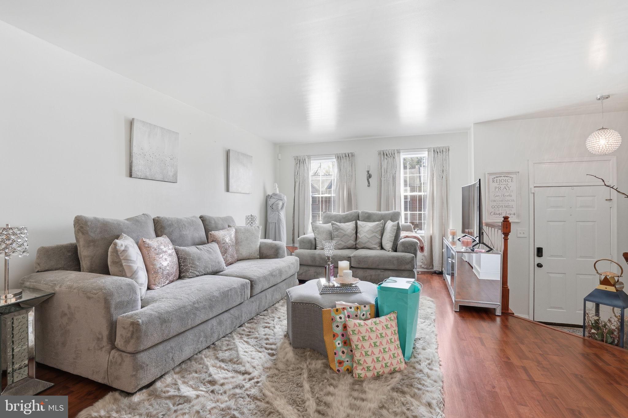 12 Sundown Court Baltimore, MD 21206 - Photo 2 of 29 a living room with furniture and a wooden floor