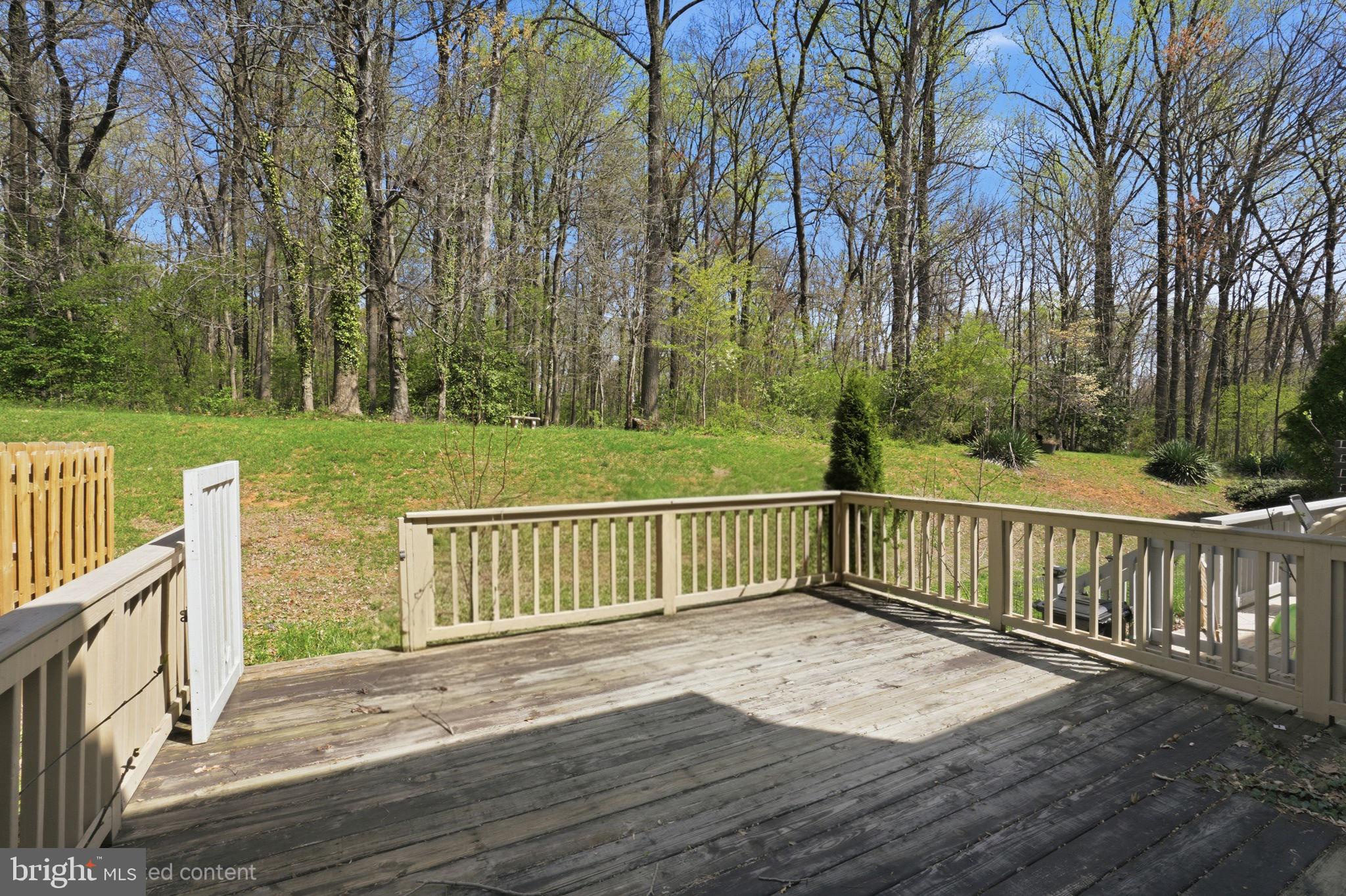 12 Sundown Court Baltimore, MD 21206 - Photo 22 of 29 a balcony with wooden floor and fence
