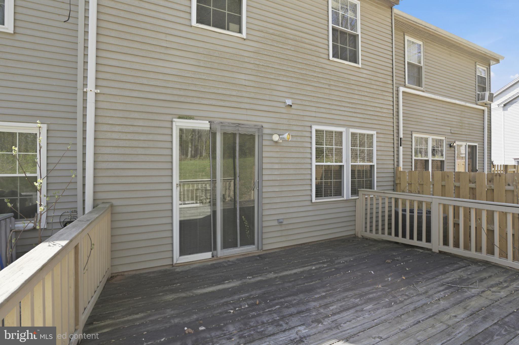 12 Sundown Court Baltimore, MD 21206 - Photo 23 of 29 a view of a deck with a large window