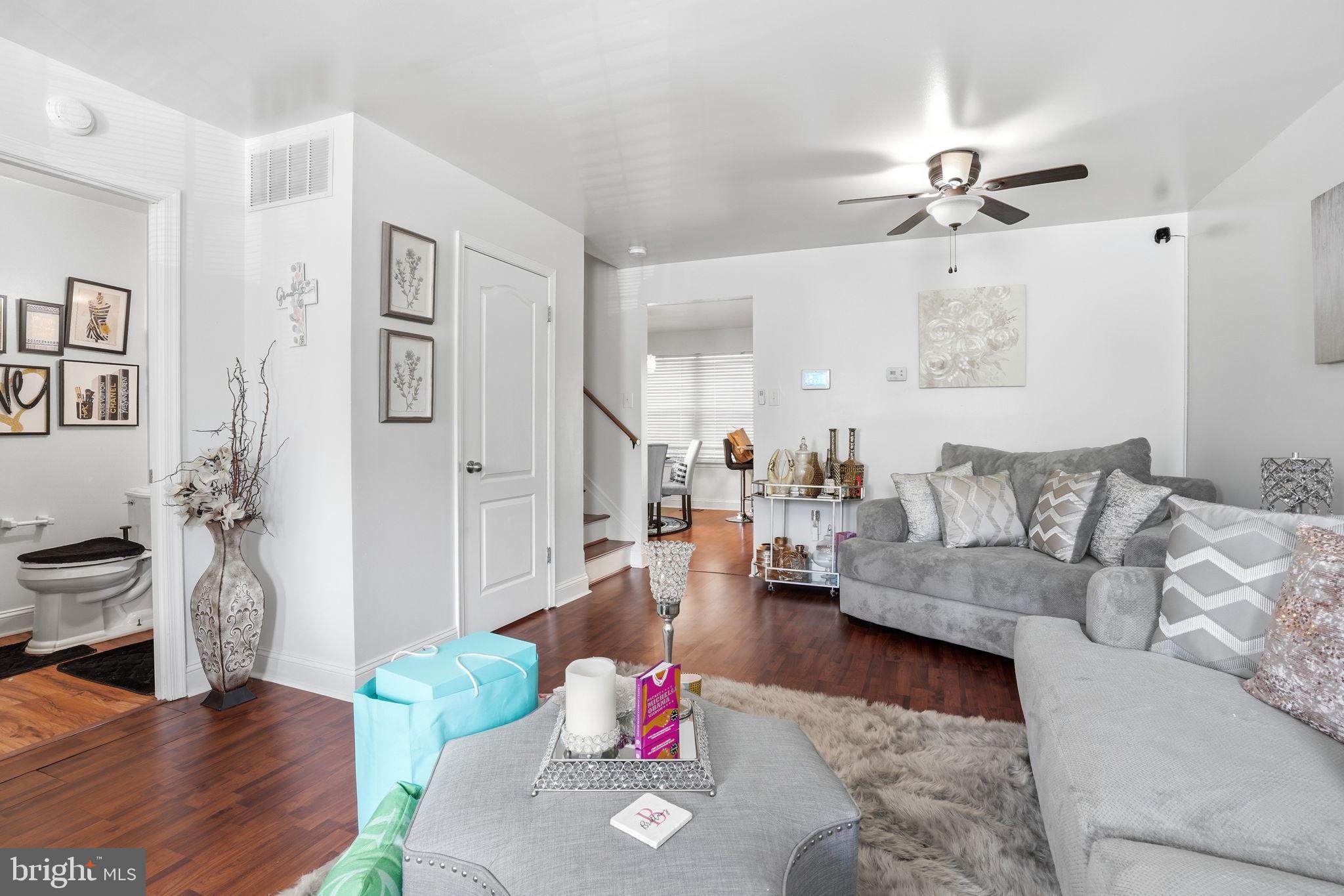 12 Sundown Court Baltimore, MD 21206 - Photo 5 of 29 a living room with furniture and wooden floor
