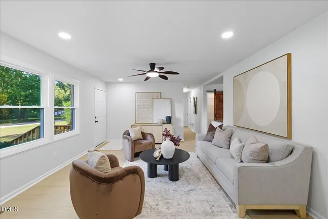 a living room with furniture and a couch