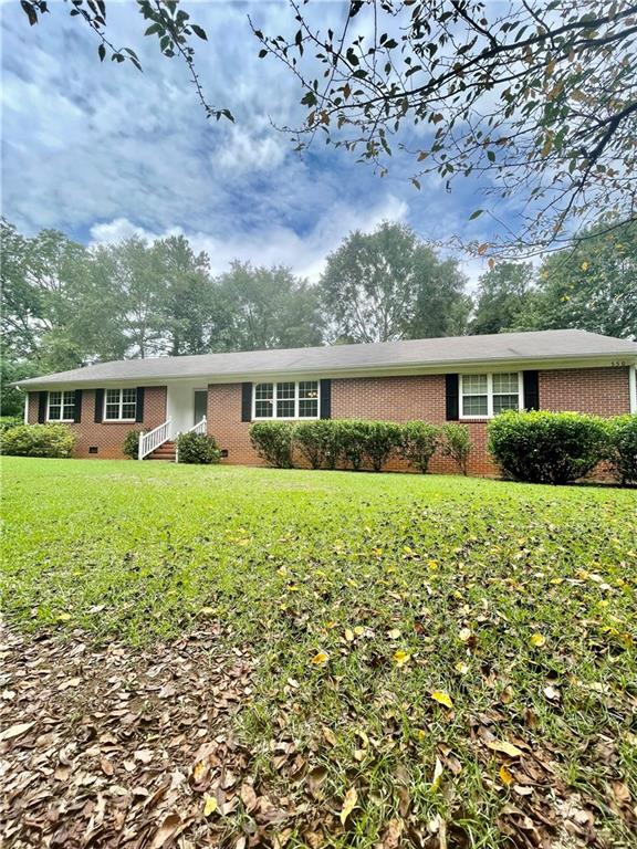 550 Jeff Davis Road Thomaston, GA 30286 - Photo 1 of 1 front view of house with a yard
