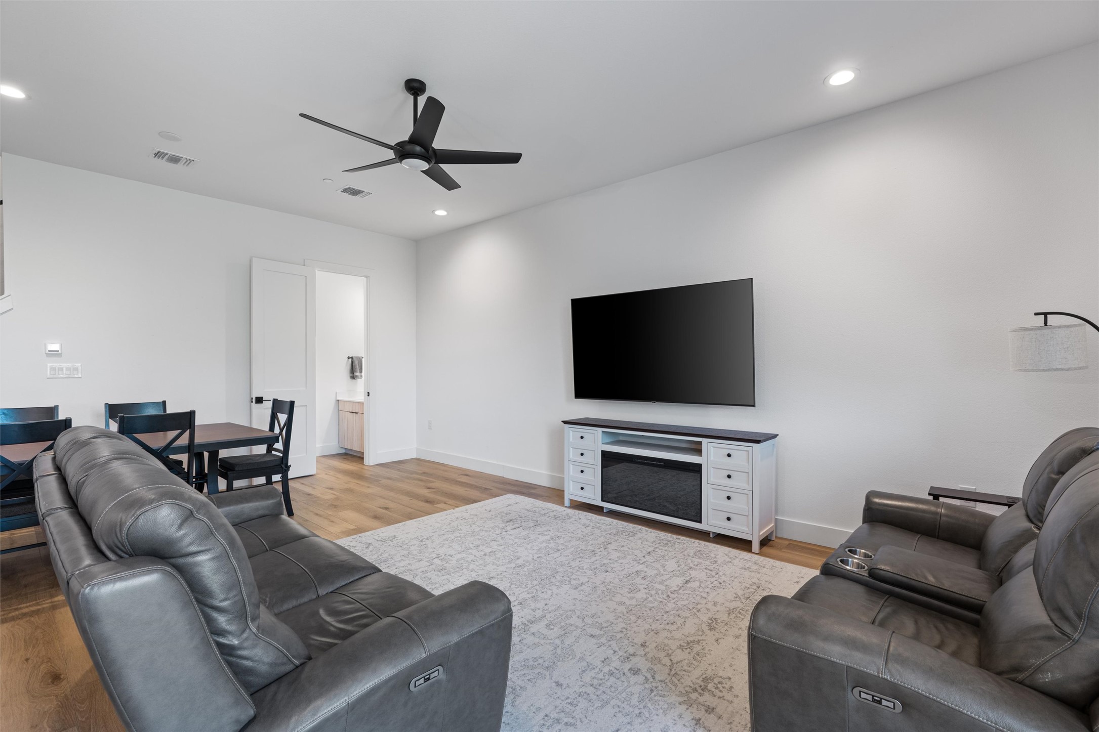 590 Old Mill Road, Unit 153 Cedar Park, TX 78613 - Photo 7 of 40 a living room with furniture and a flat screen tv