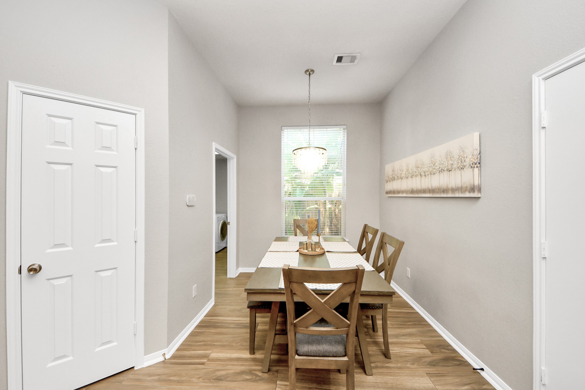 7823 Hazy Brook Lane Humble, TX 77396 - Photo 11 of 36 a view of a dining room with furniture window and wooden floor