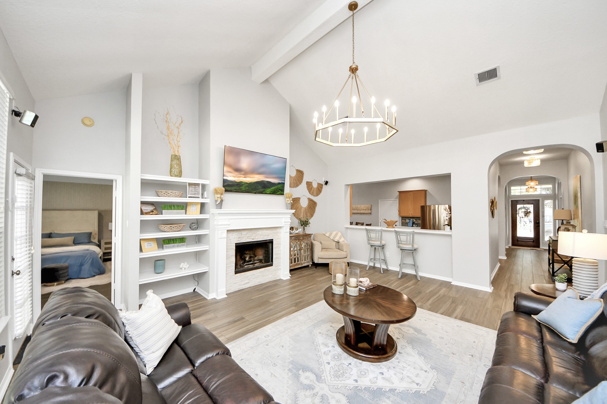 7823 Hazy Brook Lane Humble, TX 77396 - Photo 16 of 36 a living room with furniture and a fireplace