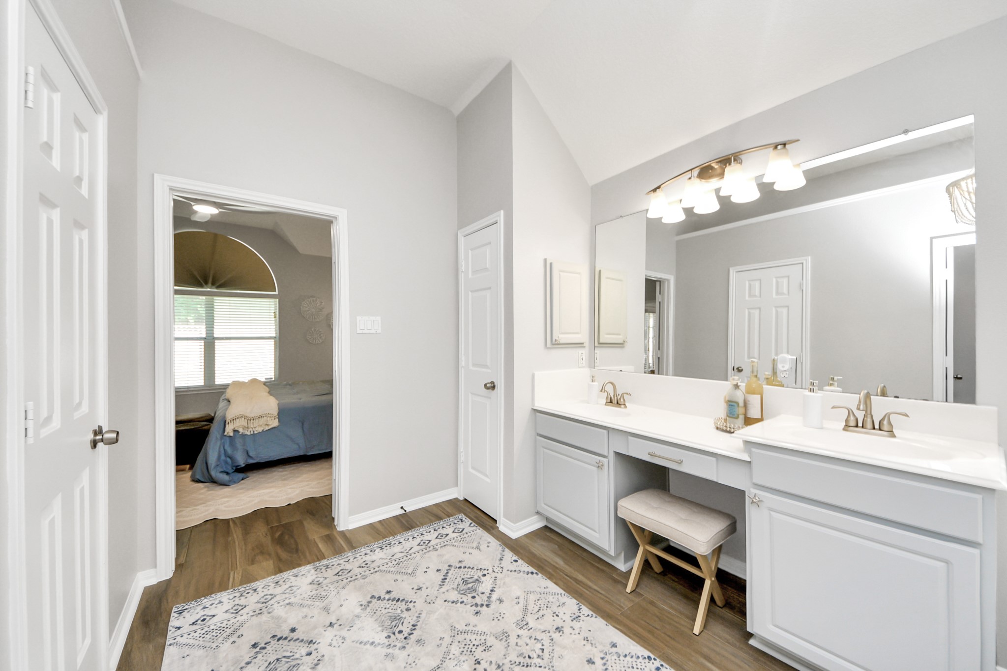 7823 Hazy Brook Lane Humble, TX 77396 - Photo 19 of 36 a en suite bathroom with a double vanity sink and a mirror