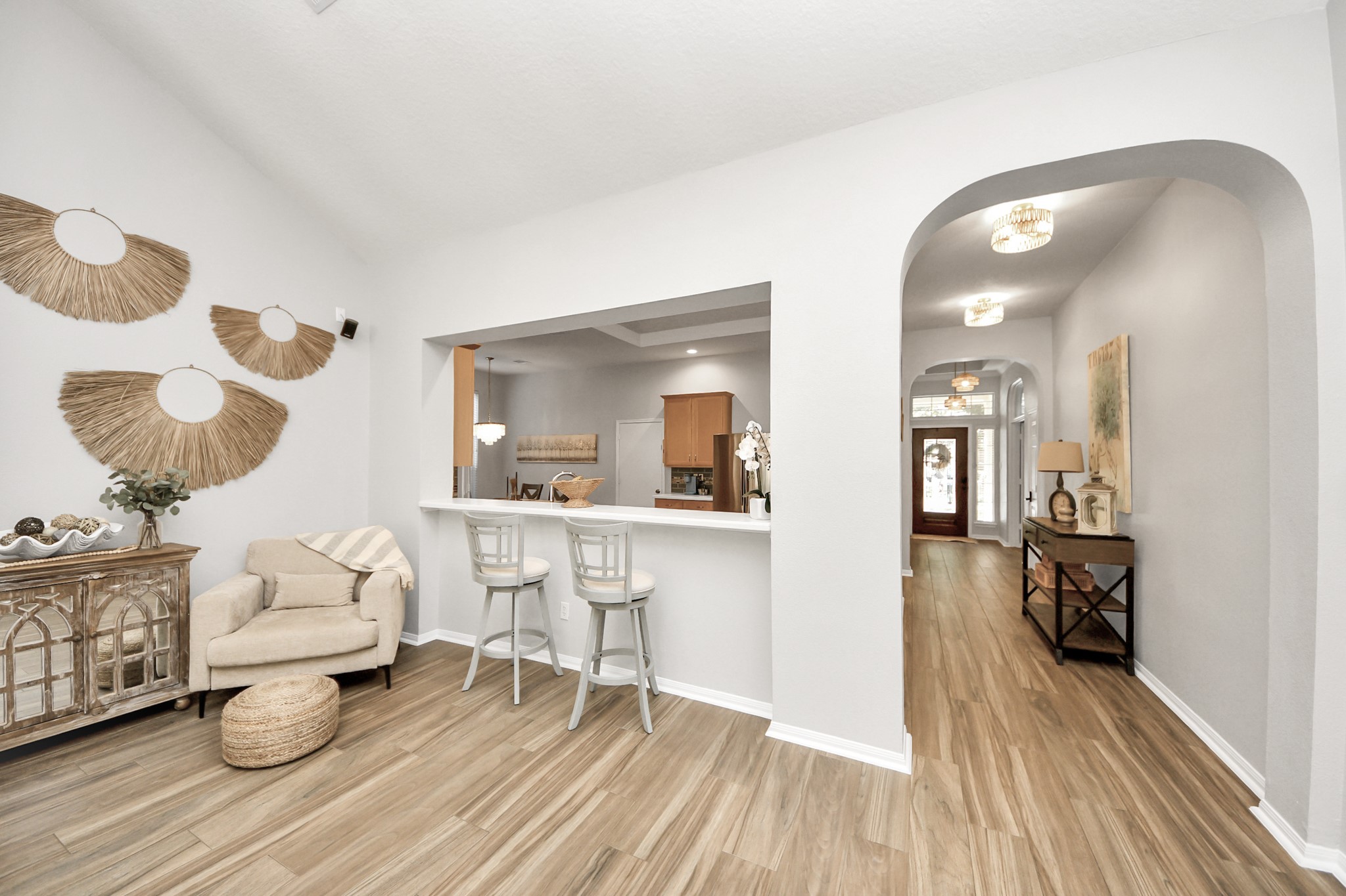 7823 Hazy Brook Lane Humble, TX 77396 - Photo 22 of 36 a living room with furniture and a wooden floor