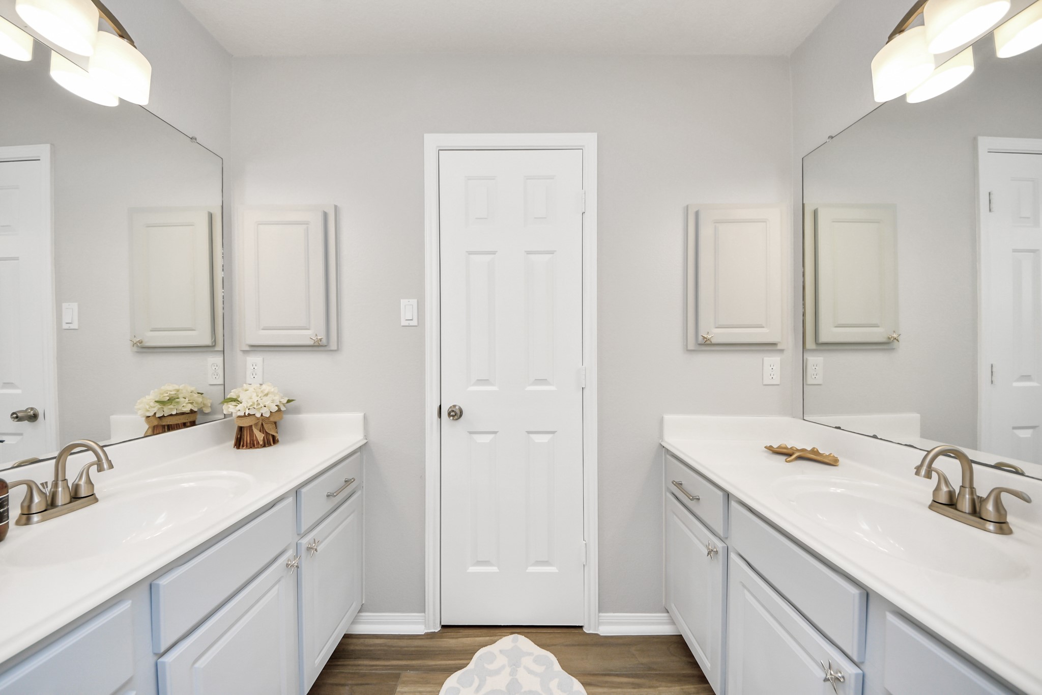 7823 Hazy Brook Lane Humble, TX 77396 - Photo 24 of 36 a bathroom with a sink double vanity and a mirror