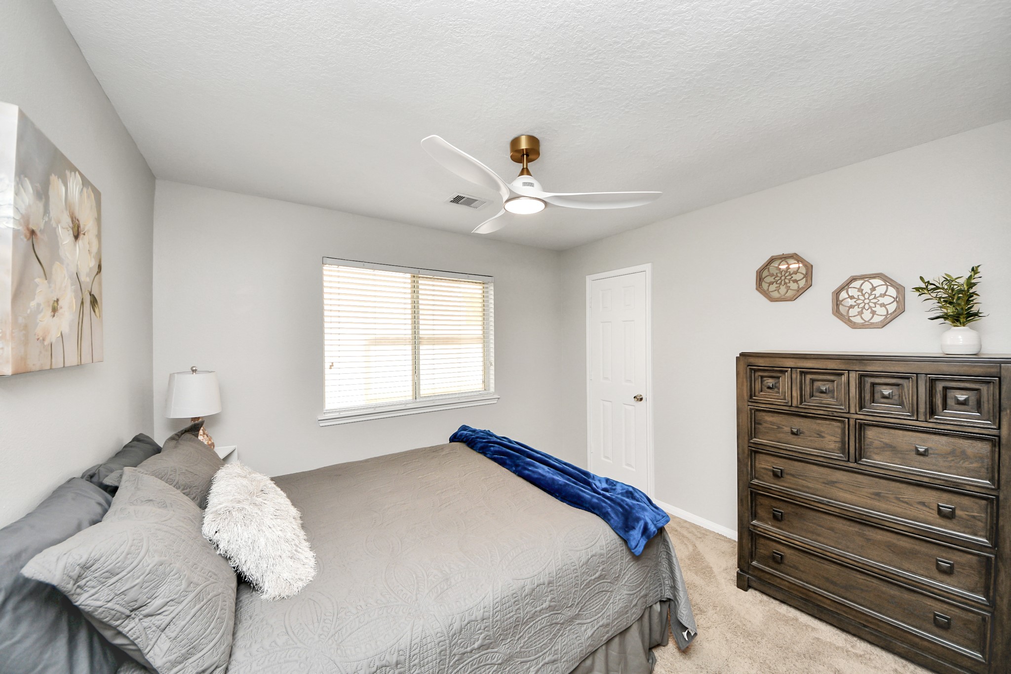7823 Hazy Brook Lane Humble, TX 77396 - Photo 27 of 36 a bedroom with a bed and a window