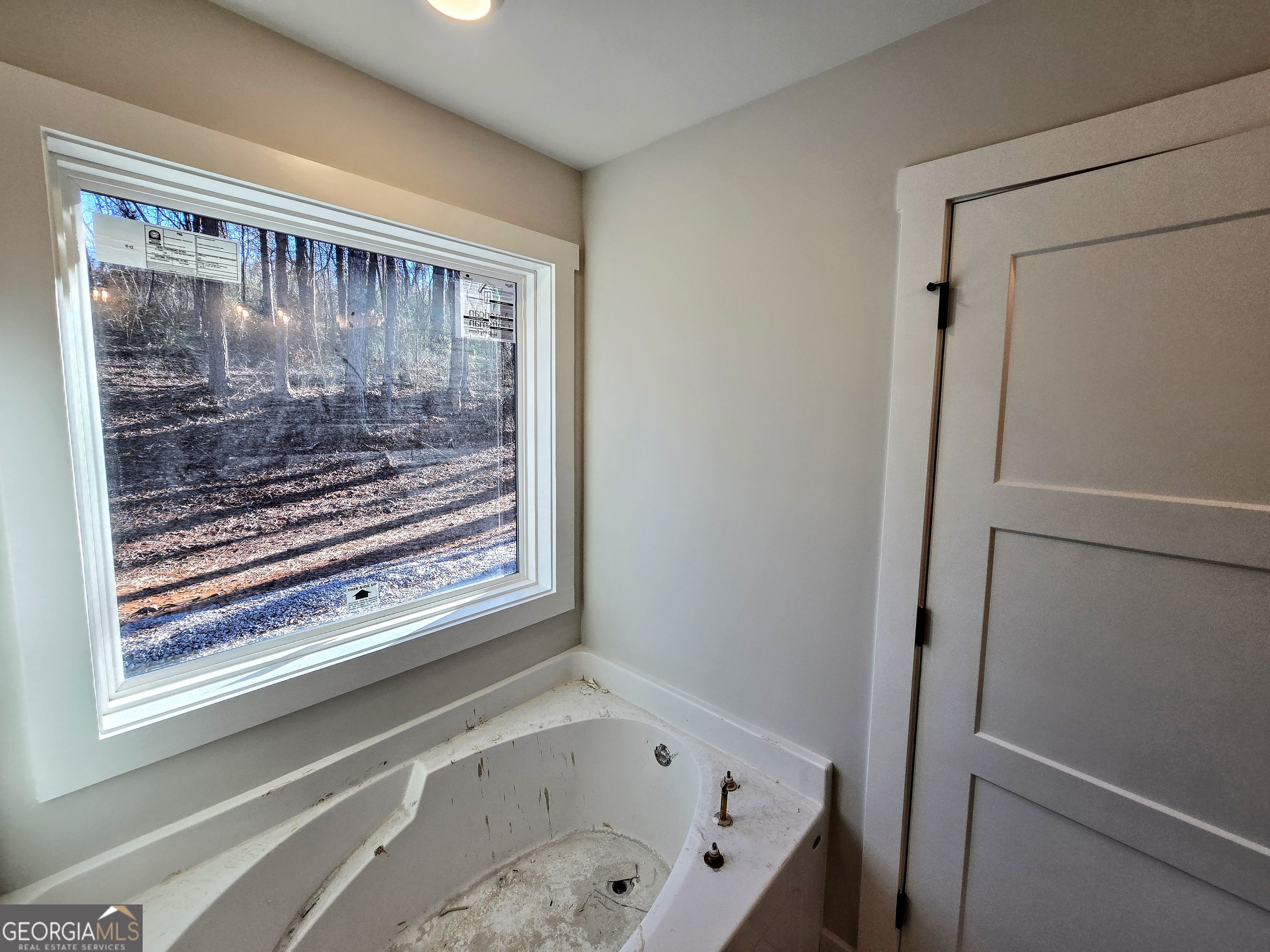 266 Center Point Road Bremen, GA 30110 - Photo 15 of 23 a bathroom with a bathtub and a shower