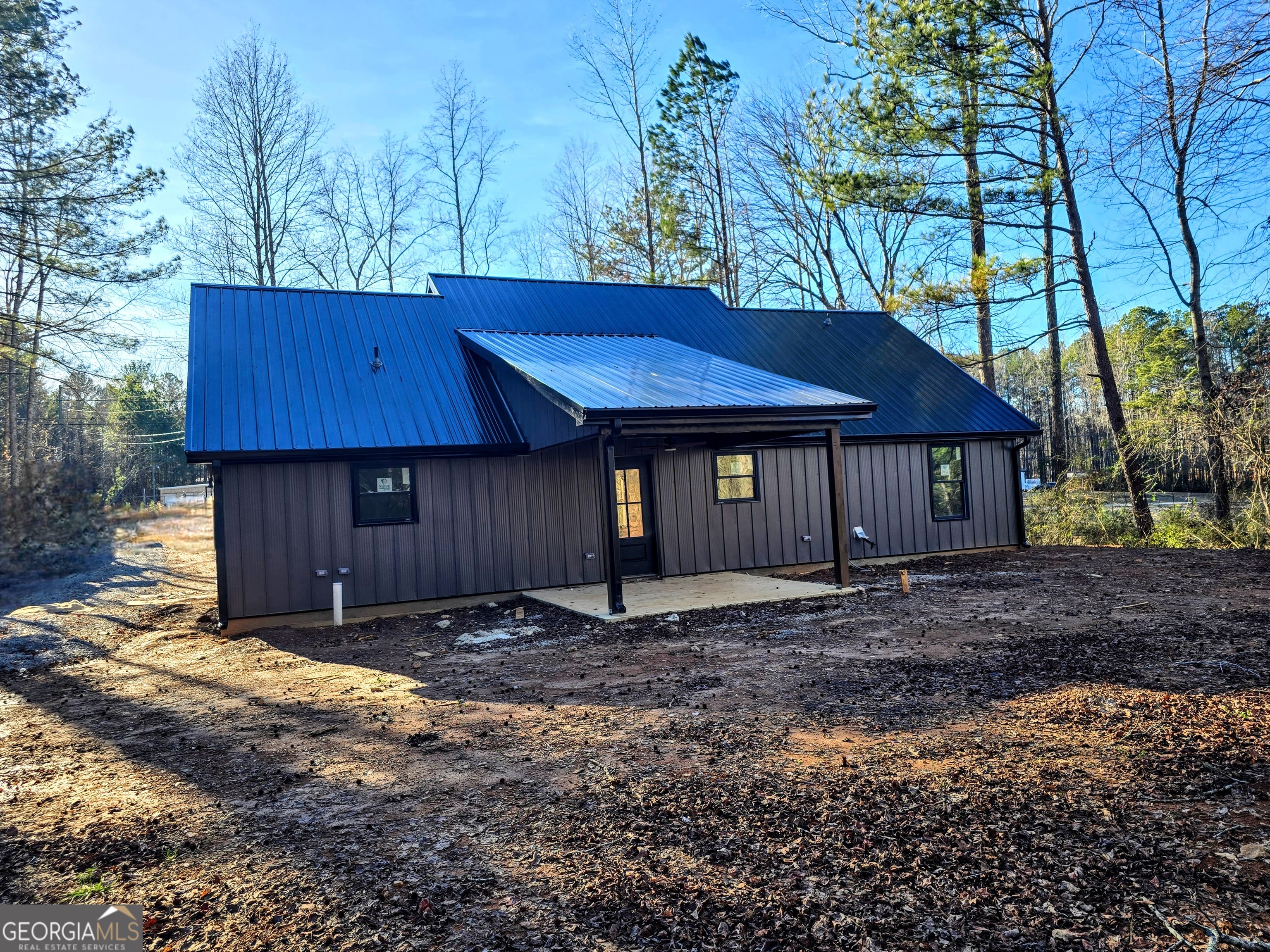 266 Center Point Road Bremen, GA 30110 - Photo 21 of 23 a house with trees in the background
