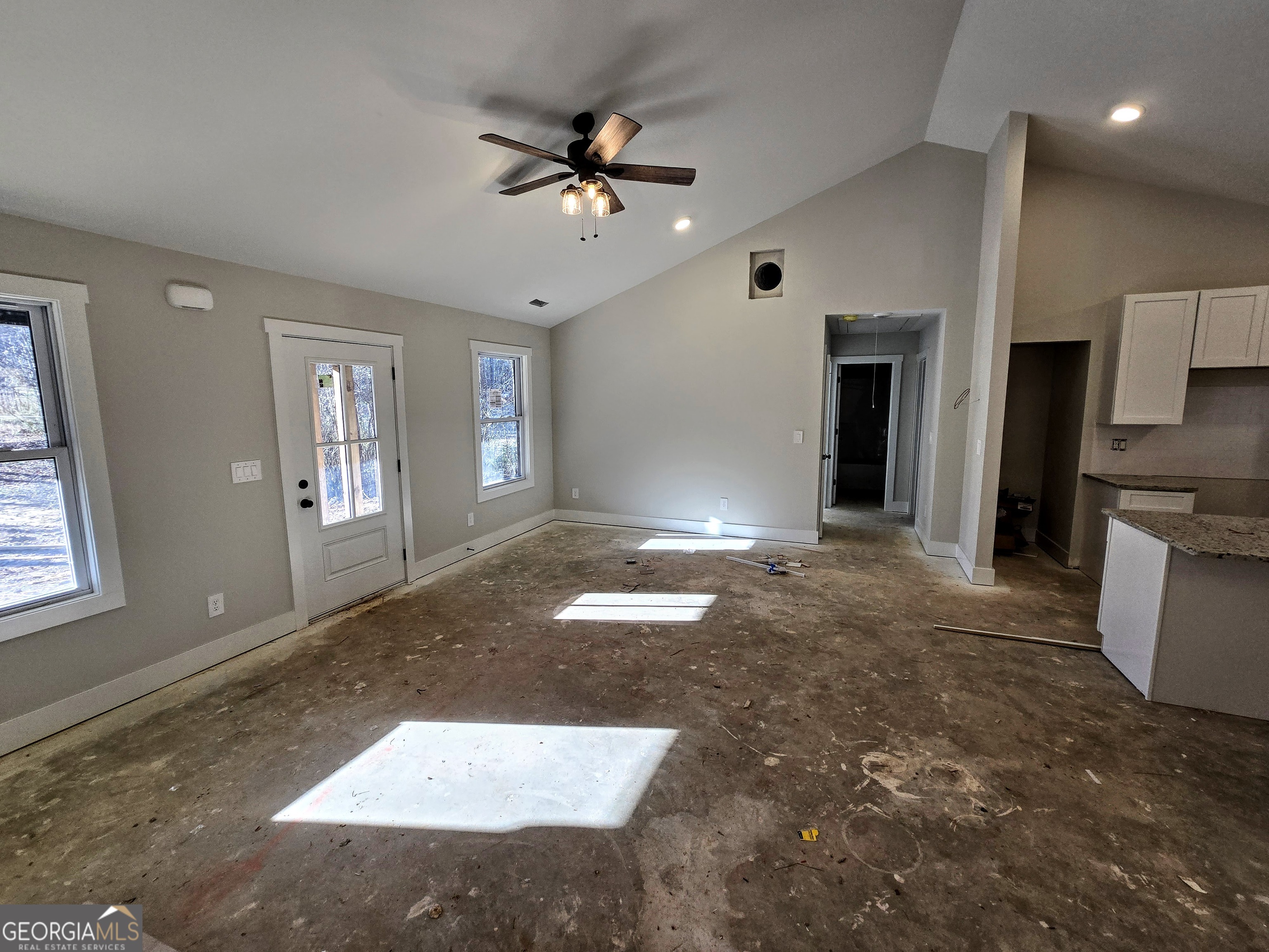 266 Center Point Road Bremen, GA 30110 - Photo 7 of 21 a view of livingroom with hardwood floor and a ceiling fan