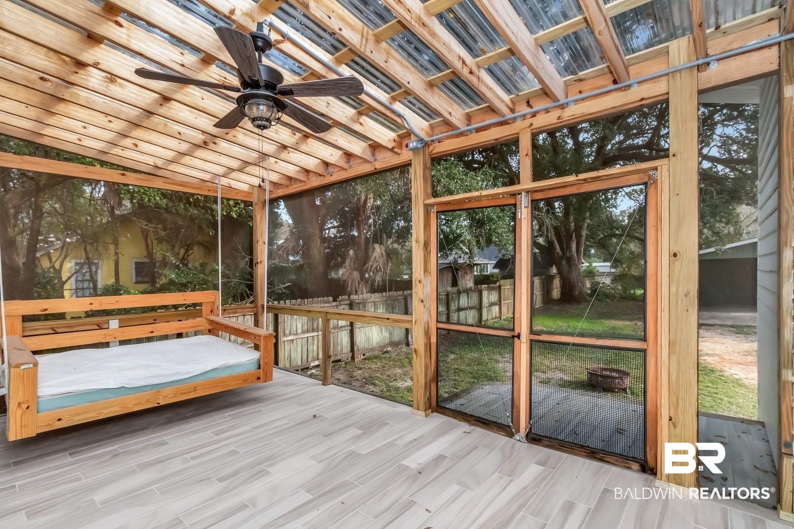 2157 Homewood Street Mobile, AL 36606 - Photo 29 of 36 Unfurnished sunroom featuring ceiling fan