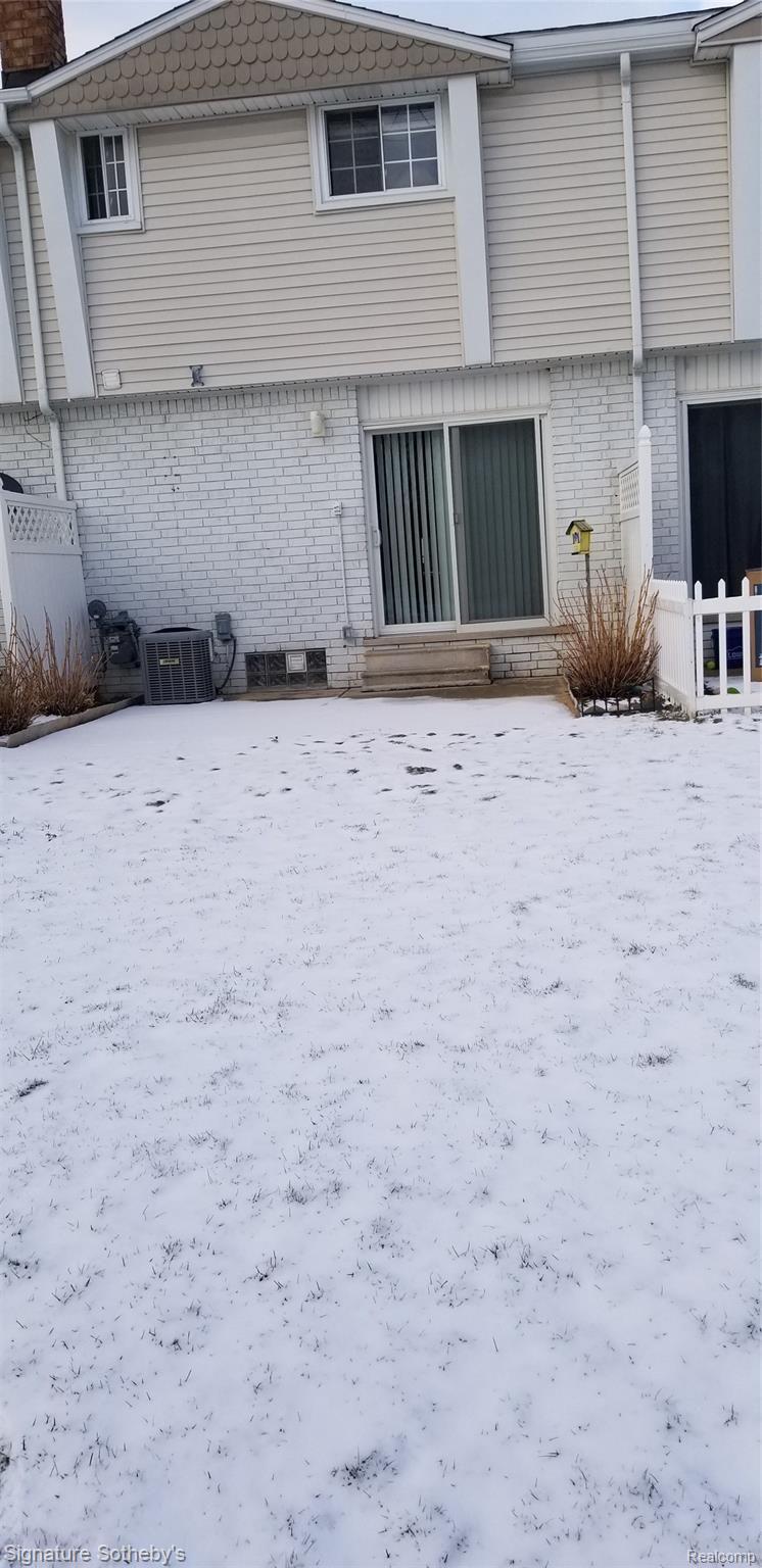 67976 Van Dyke Road, Unit 9 Washington, MI 48095 - Photo 11 of 20 Doorwall to patio