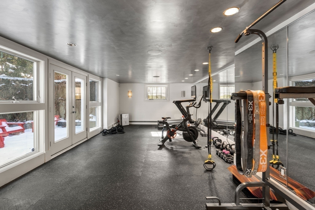 24 Colonial Way Weston, MA 02493 - Photo 25 of 32 a view of a room with gym equipment