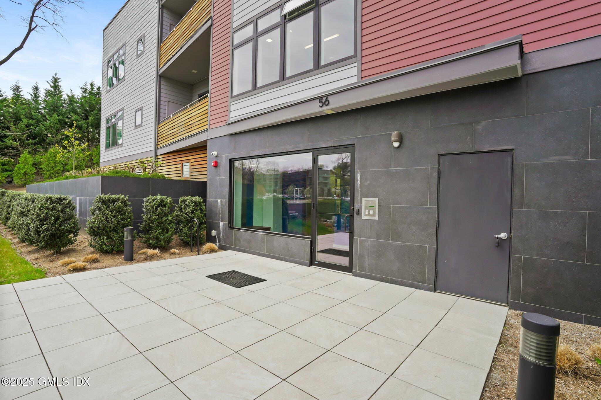 56 Old Field Point Road, Unit 2 Greenwich, CT 06830 - Photo 18 of 20 a view of a entryway of the house