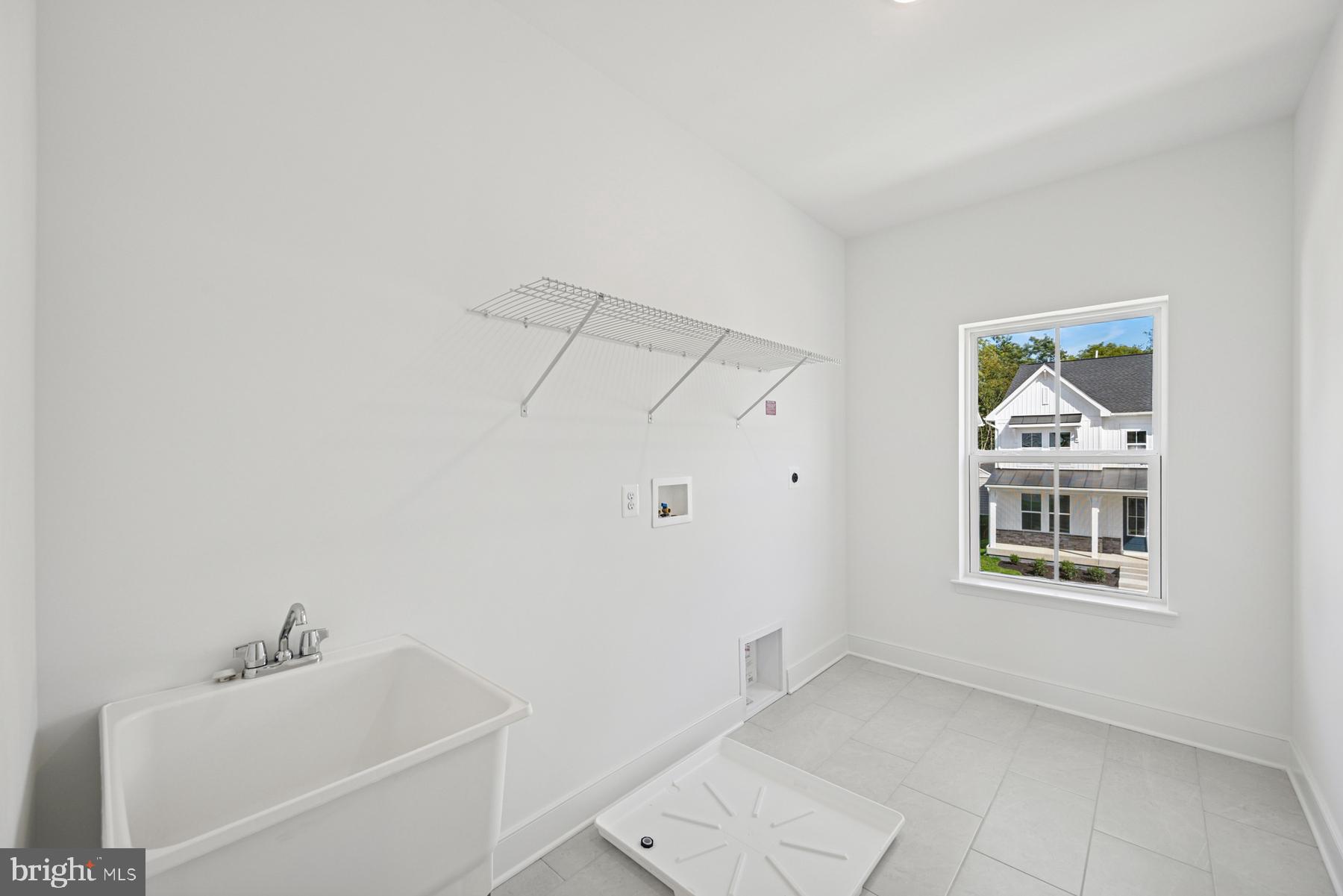 2730 Tuscarora Road Adamstown, MD 21710 - Photo 19 of 37 a bathroom with a bathtub and a sink