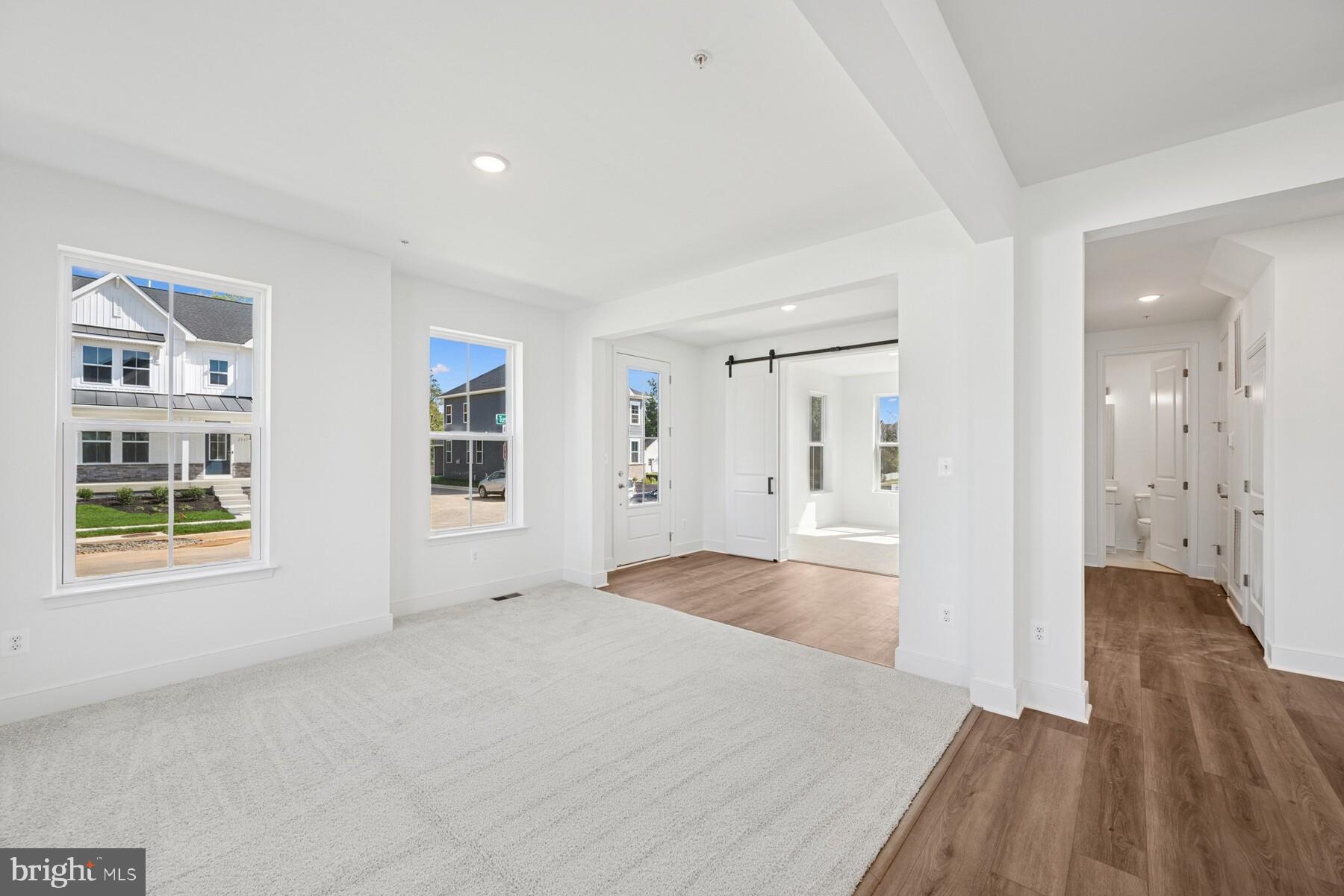 2730 Tuscarora Road Adamstown, MD 21710 - Photo 31 of 37 a view of an empty room with wooden floor and a window