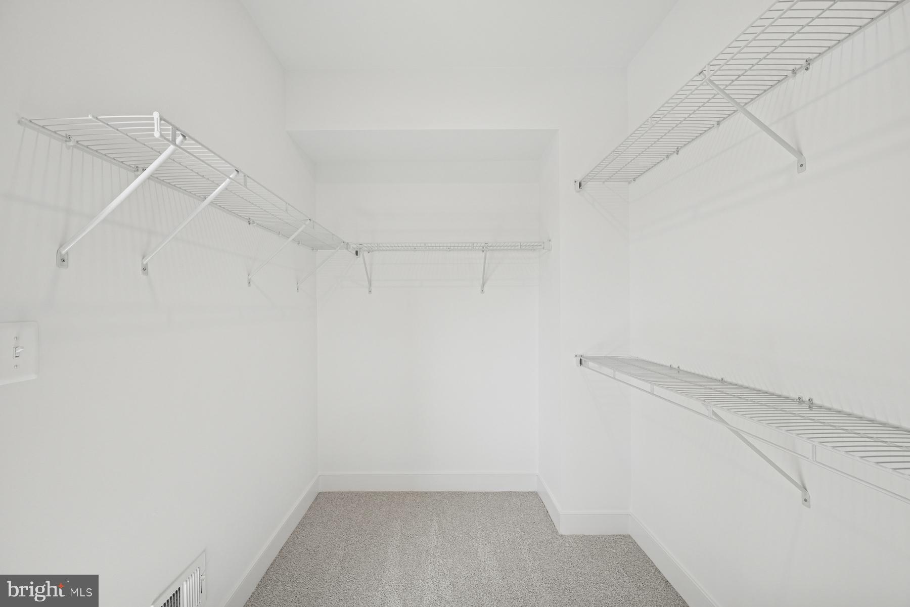 2730 Tuscarora Road Adamstown, MD 21710 - Photo 10 of 37 a view of a room with racks on the wall