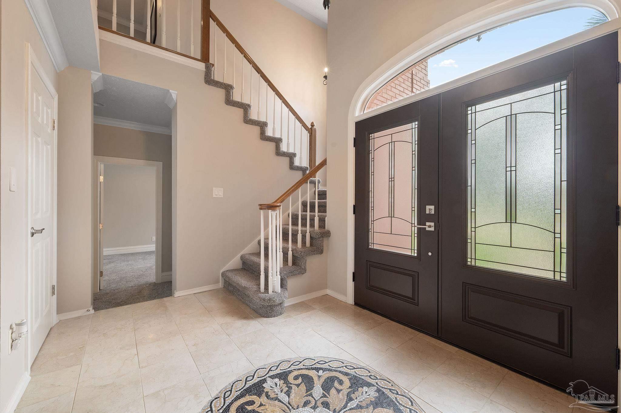 5631 Ballybunion Drive Pace, FL 32571 - Photo 4 of 43 Custom Tile Mosaic - Grand Double Door Entry