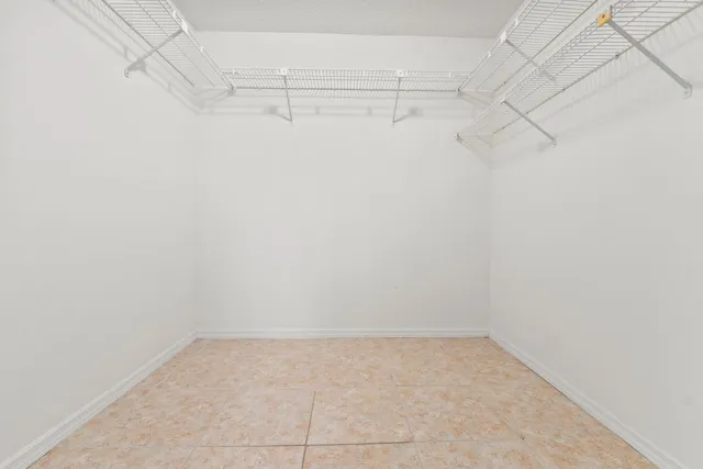 a view of a room with racks on the wall