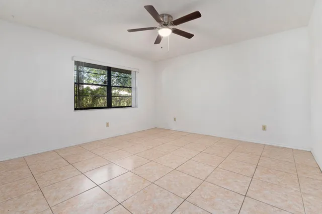 a view of an empty room and window