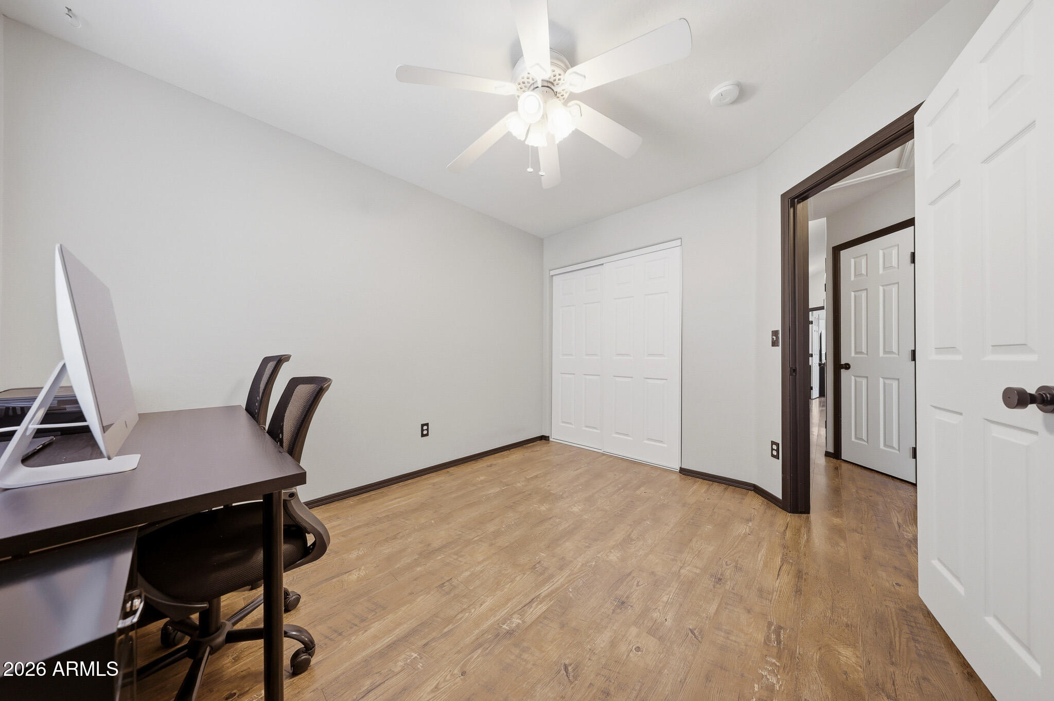 2167 East Nighthawk Way Phoenix, AZ 85048 - Photo 22 of 28 a workspace with a table and chairs