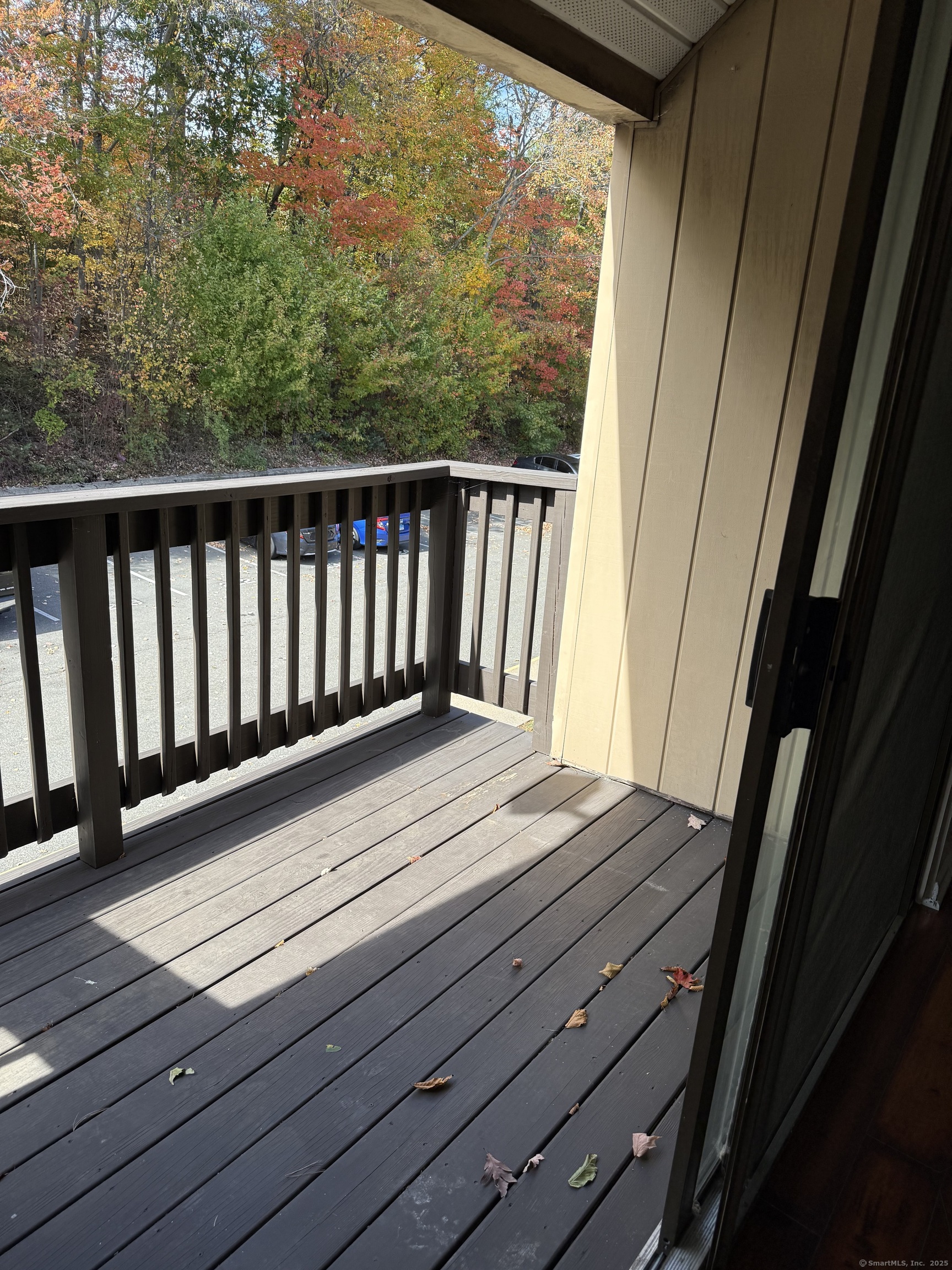 175 Mill Pond Road, Unit 215 Hamden, CT 06514 - Photo 14 of 19 a view of balcony with wooden floor