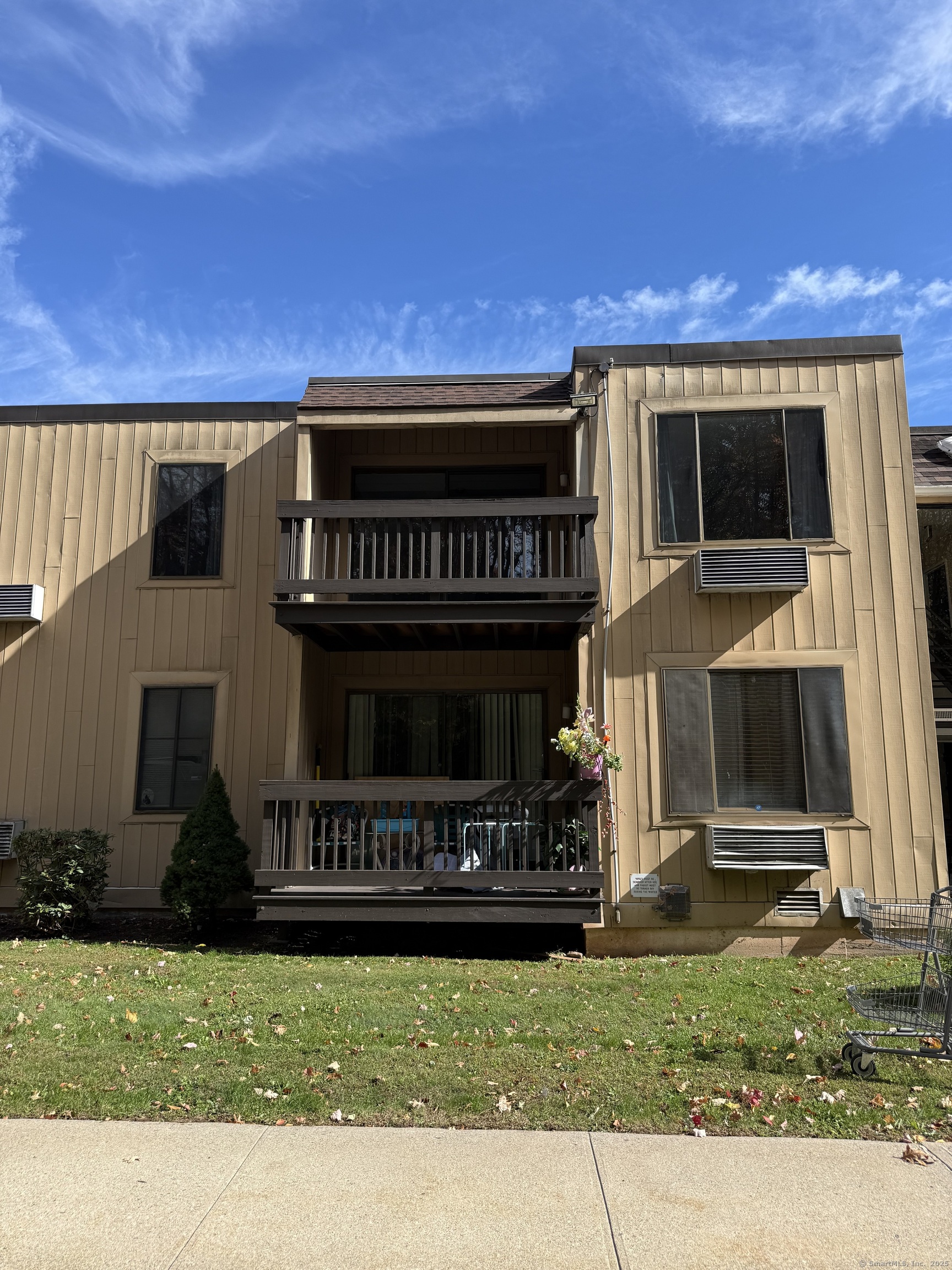 175 Mill Pond Road, Unit 215 Hamden, CT 06514 - Photo 16 of 19 a view of a house with a yard