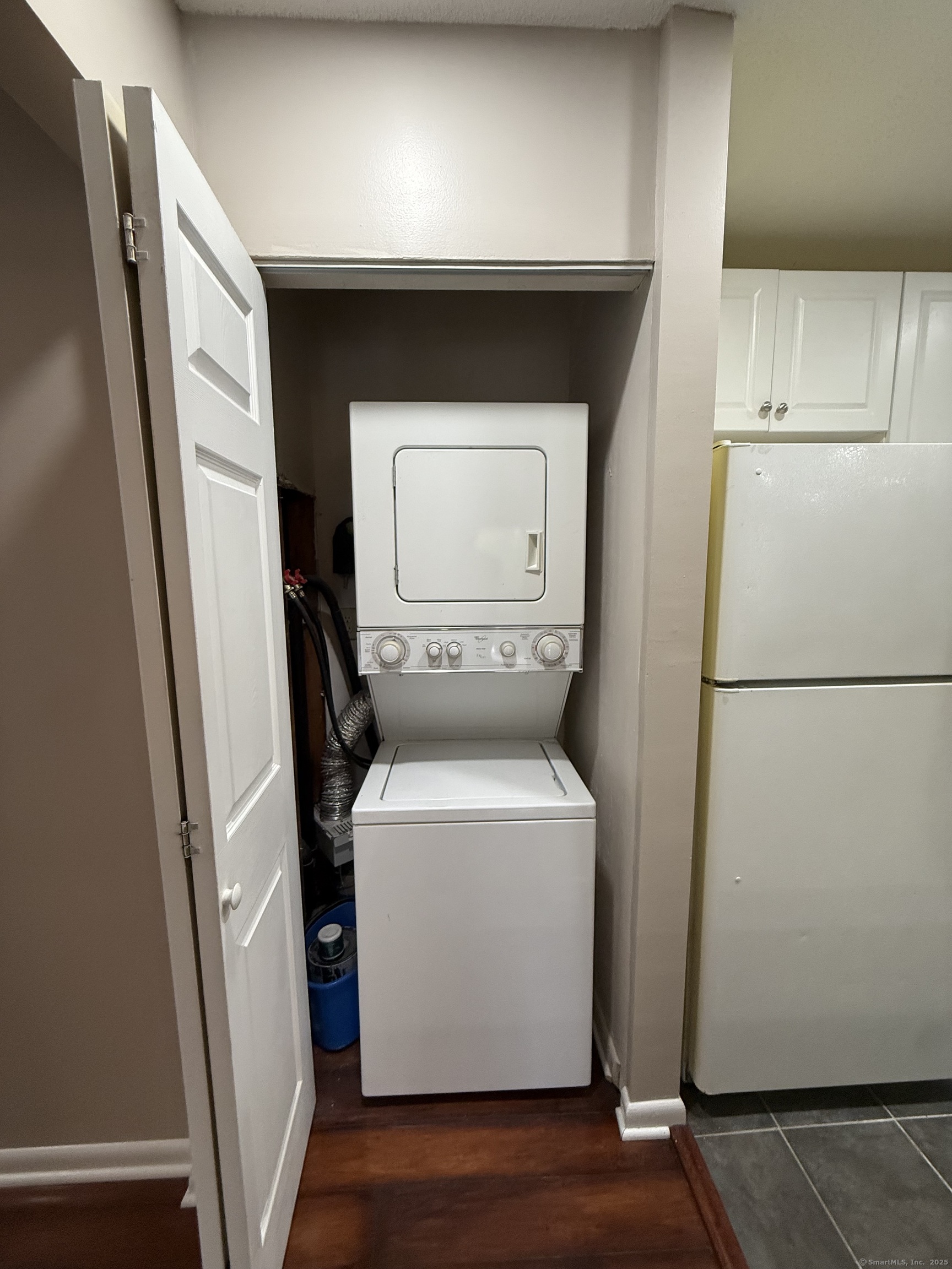 175 Mill Pond Road, Unit 215 Hamden, CT 06514 - Photo 6 of 19 a utility room with dryer and washer