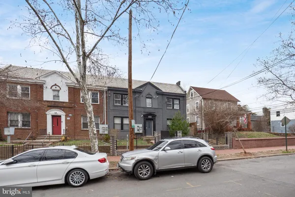 a car parked in front of a house