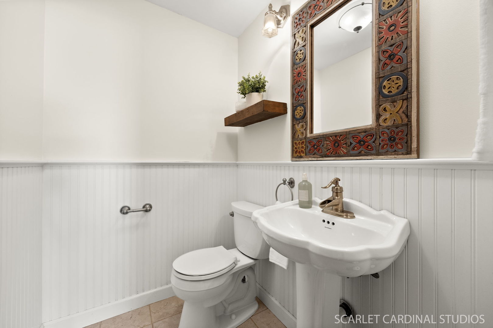 26W275 Tomahawk Drive Wheaton, IL 60189 - Photo 11 of 41 a bathroom with a sink a mirror and toilet