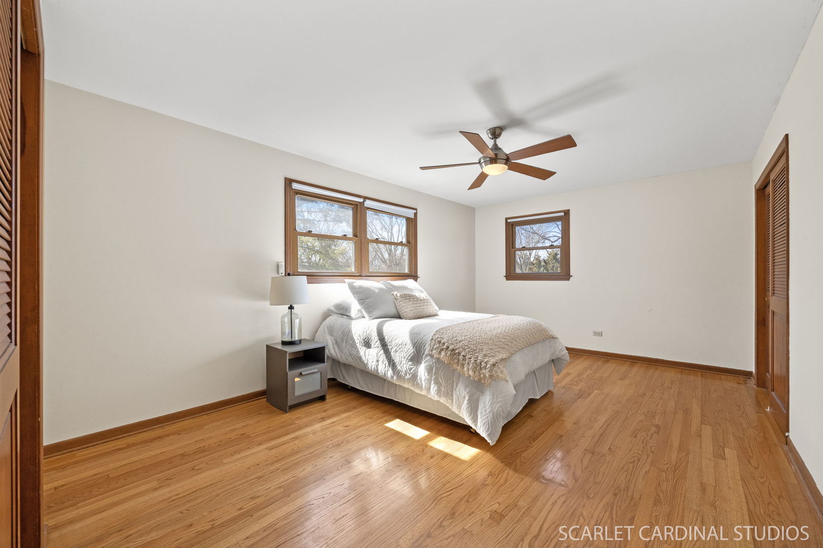 26W275 Tomahawk Drive Wheaton, IL 60189 - Photo 14 of 41 a bedroom with a bed and a large window