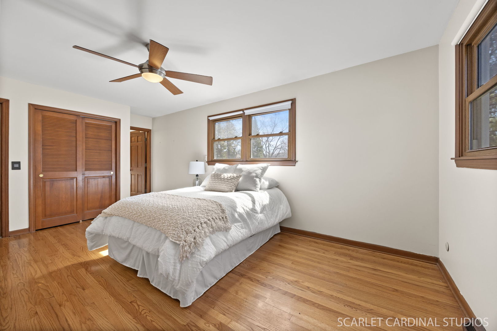 26W275 Tomahawk Drive Wheaton, IL 60189 - Photo 15 of 41 a spacious bedroom with a bed and a window