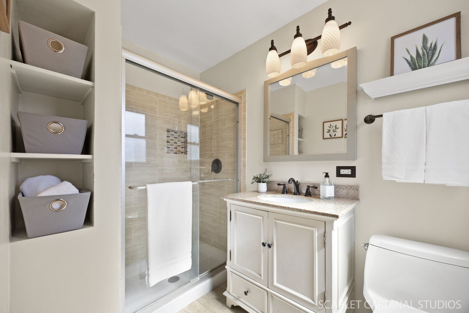 26W275 Tomahawk Drive Wheaton, IL 60189 - Photo 16 of 41 a bathroom with a sink a toilet and a mirror
