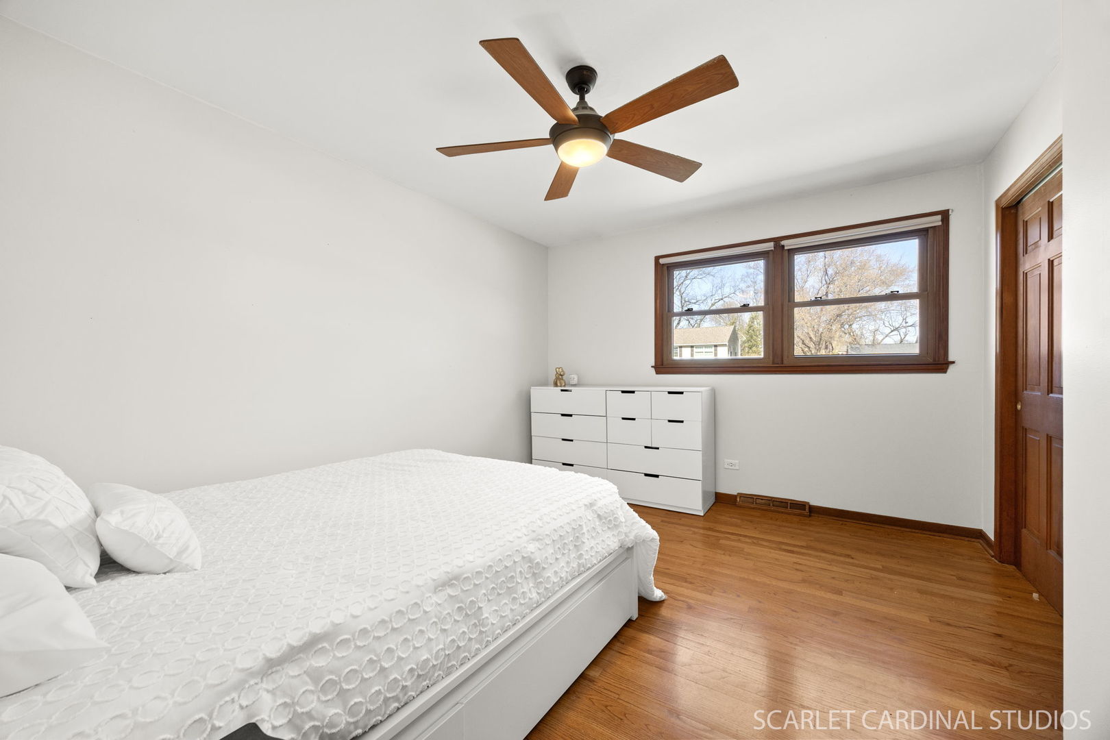 26W275 Tomahawk Drive Wheaton, IL 60189 - Photo 17 of 41 a bedroom with a bed and window