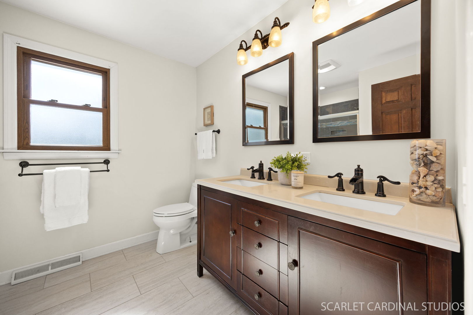 26W275 Tomahawk Drive Wheaton, IL 60189 - Photo 19 of 41 a bathroom with a granite countertop sink mirror and toilet