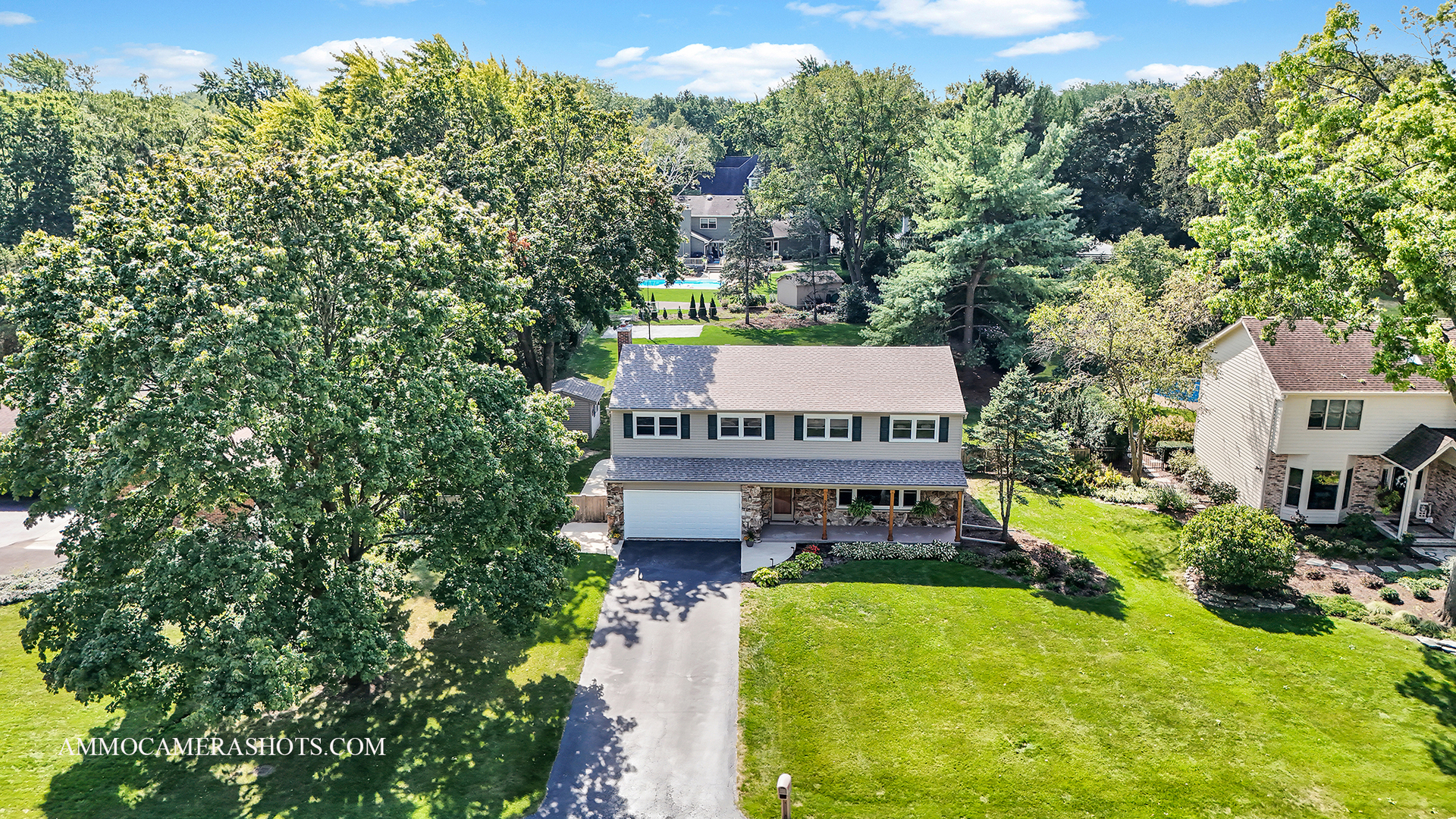 26W275 Tomahawk Drive Wheaton, IL 60189 - Photo 2 of 41 a front view of a house with a yard