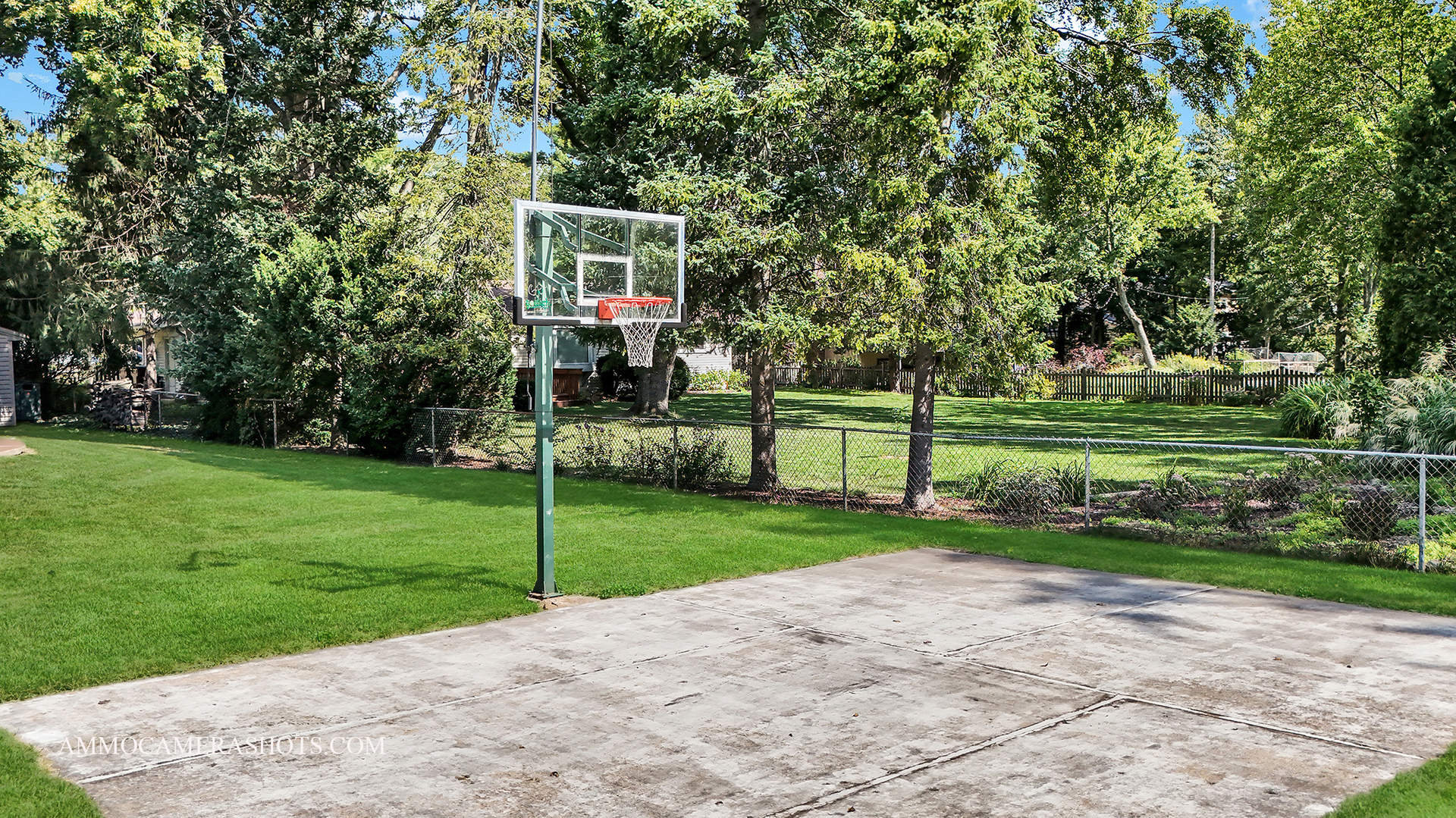 26W275 Tomahawk Drive Wheaton, IL 60189 - Photo 31 of 41 a view of a house with a big yard and a large trees