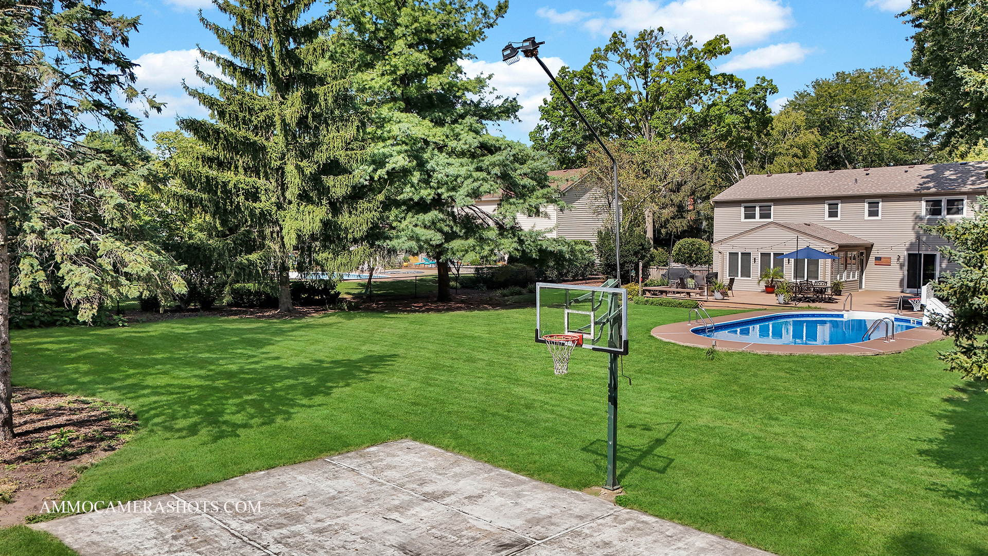 26W275 Tomahawk Drive Wheaton, IL 60189 - Photo 32 of 41 a view of a house with a big yard potted plants and large tree