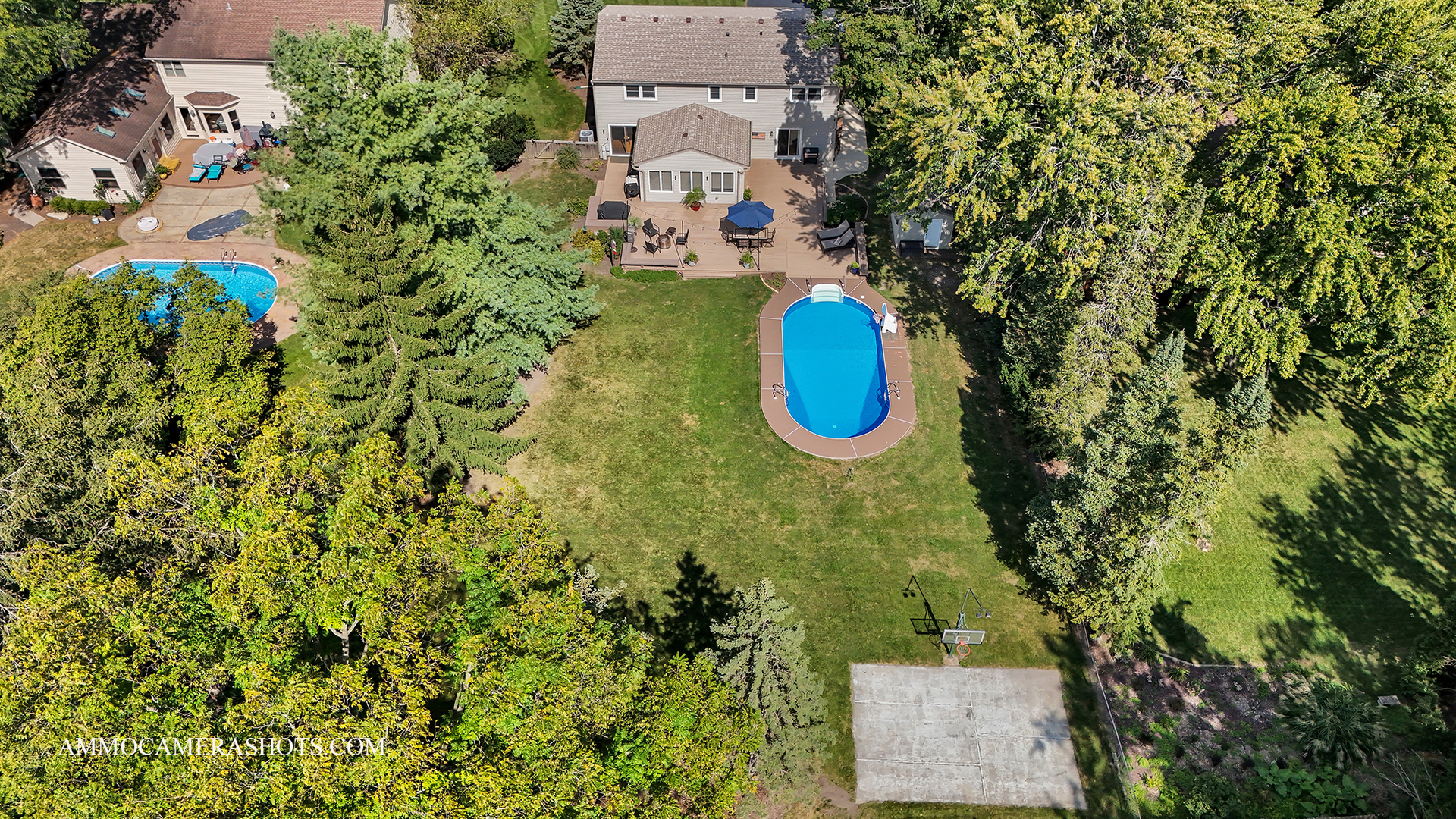 26W275 Tomahawk Drive Wheaton, IL 60189 - Photo 35 of 41 an aerial view of a house with a swimming pool fire pit and outdoor seating