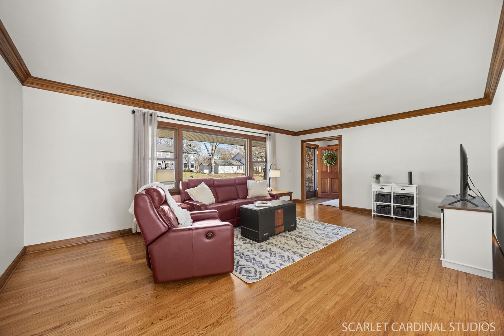 26W275 Tomahawk Drive Wheaton, IL 60189 - Photo 4 of 41 a living room with furniture and large windows
