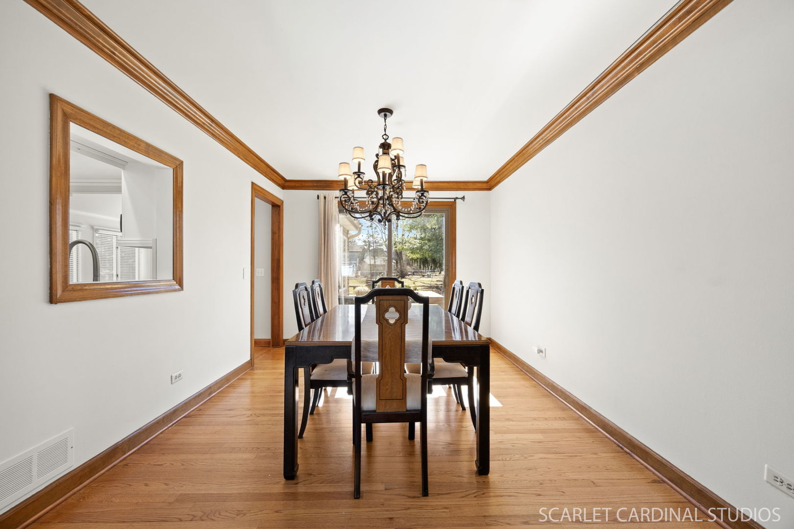 26W275 Tomahawk Drive Wheaton, IL 60189 - Photo 8 of 41 a view of a dining room with furniture and wooden floor